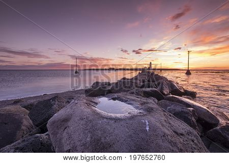 Dramatic sunset at Grotta lighthouse in Iceland