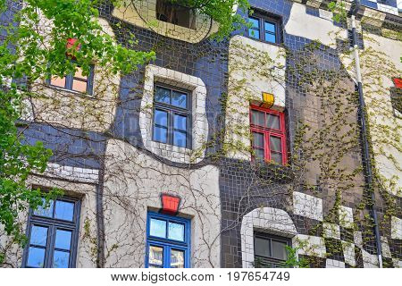 Vienna Austria - April 27 2015: Facade detail of the famous Hundertwasserhaus in Vienna Austria. Shot taken on April 27th 2015