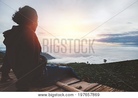 Asian man travel sleep relax. Morning atmosphere nature Forests mountains. Phu Thap Buek Thailand
