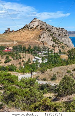 View of the resort town of Sudak on the coast of the Black sea from Genoese fortress on the mountain Cenevez Qaya