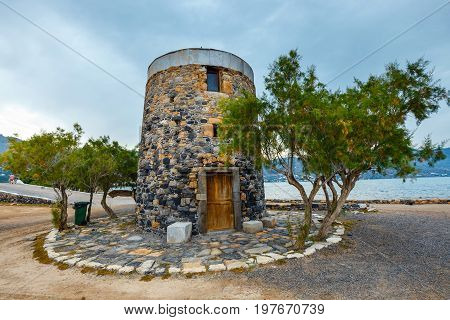 Ancient Windmill On Kalydon Peninsula Near Agios Nikolaos, Crete, Greece