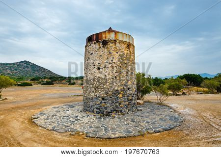 Ancient Windmill On Kalydon Peninsula Near Agios Nikolaos, Crete, Greece