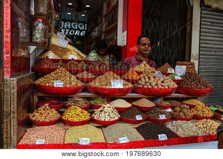 Selling Nuts And Dried Fruits At A Bazaar In India