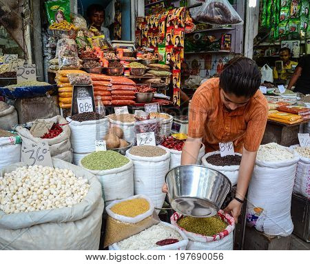Selling Nuts And Dried Fruits At A Bazaar In India