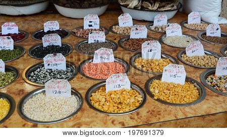 Selling Nuts And Dried Fruits At A Bazaar In India