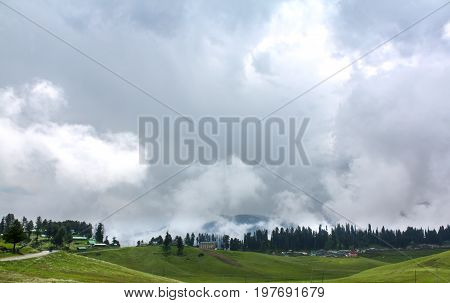 Big mountain White cloud cover,Green forest, ,Kashmir ,Indian