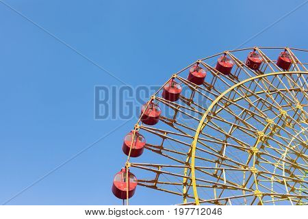 Big Ferris Wheel with Blue Sky Background