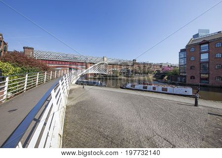 Wide view of Castlefield Basin Manchester's industrial heritage heart on a sunny morning