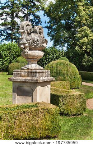 Sandstone baroque statues at the Buchlovice castle in the Czech Republic. Decorative sculptures in the garden