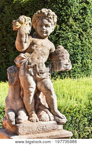 Sandstone baroque statues at the Buchlovice castle in the Czech Republic. Decorative sculptures in the garden