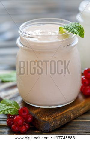 Sour Baked Milk In A Glass Jar.