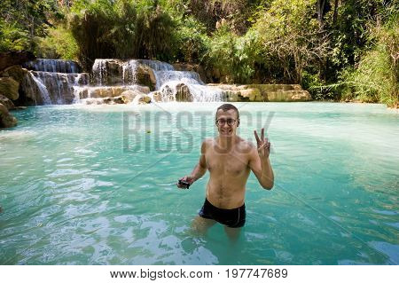 Man Bathing Kuang Si Waterfall
