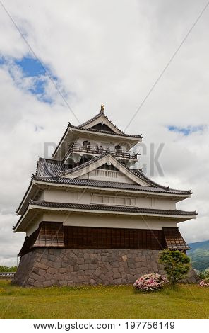 KAMINOYAMA JAPAN - MAY 28 2017: Main Keep (donjon) of Kaminoyama Castle Japan. Castle was founded in 1535 by Takenaga Yoshitada destroyed in 1692 and reconstructed in 1982