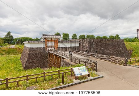 YAMAGATA JAPAN - MAY 28 2017: Reconstructed Otebashi Bridge (2005) and Ichimonji Gate (2014) of Main Bailey of Yamagata Castle (founded in 1356). National historical site of Japan since 1986