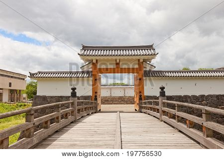 YAMAGATA JAPAN - MAY 28 2017: Reconstructed Otebashi Bridge (2005) and Ichimonji Gate (2014) of Main Bailey of Yamagata Castle (founded in 1356). National historical site of Japan since 1986