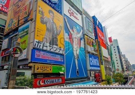 OSAKA, JAPAN - JULY 18, 2017: Day view of sign advertisements at Numba area, in a cloudy day in Osaka City, Japan.