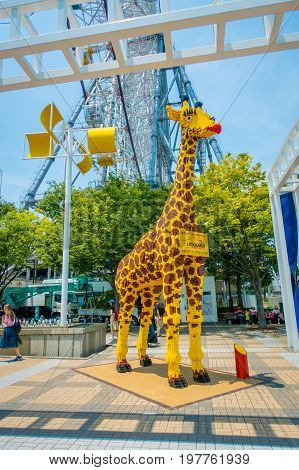 OSAKA, JAPAN - JULY 18, 2017: Beautiful giraffe made with legos at Tempozan Ferris Wheel in Osaka, Japan. It is located in Tempozan Harbor Village, next to Osaka Aquarium Kaiyukan.