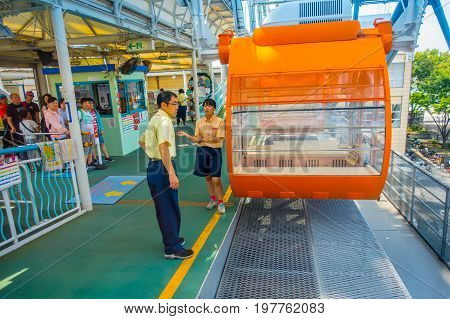 OSAKA, JAPAN - JULY 18, 2017: Close up of Tempozan Ferris Wheel in Osaka, Japan. The wheel has a height of 112.5 metres, it's opened in 1997, situated in Tempozan Harbor Village.