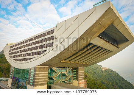 HONG KONG, CHINA - JANUARY 22, 2017: View of the Peak Tower in Hong Kong a top Victoria Peak. At 428 meters above sea level, this iconic landmark features the highest viewing platform in Hong Kong.