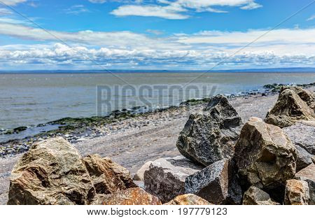 Closeup Of Rocks And Saint Lawrence River In Saint-irenee, Quebec, Canada In Charlevoix Region With