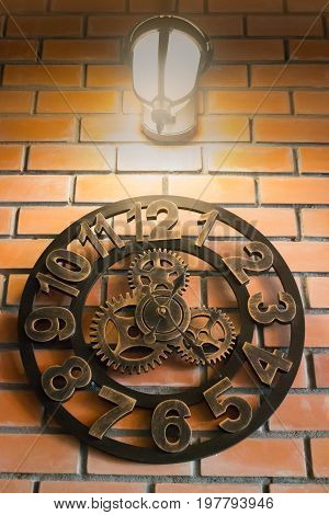Vintage wall clock on brick room stock photo