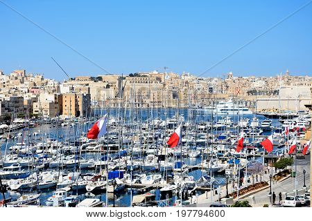 VITTORIOSA, MALTA - MARCH 31, 2017 - Elevated view of Vittoriosa waterfront and marina with views towards Senglea and Valletta Vittoriosa (Birgu) Malta Europe, March 31, 2017.