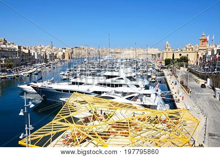 VITTORIOSA, MALTA - MARCH 31, 2017 - Elevated view of Vittoriosa waterfront and marina with views towards Senglea and Valletta Vittoriosa (Birgu) Malta Europe, March 31, 2017.