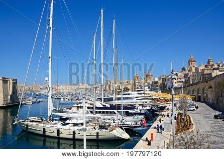 VITTORIOSA, MALTA - MARCH 31, 2017 - Elevated view of Vittoriosa marina and waterfront with views towards Senglea and Valletta Vittoriosa (Birgu) Malta Europe, March 31, 2017.