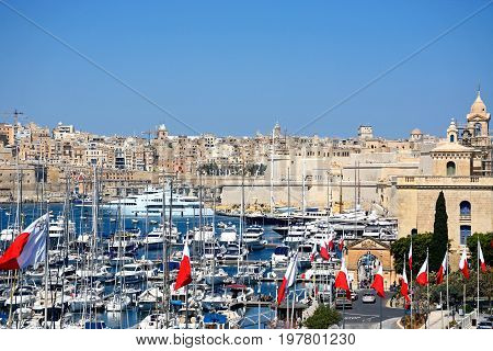 VITTORIOSA, MALTA - MARCH 31, 2017 - Elevated view of Vittoriosa marina and waterfront with views towards Valletta Vittoriosa (Birgu) Malta Europe, March 31, 2017.