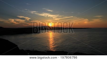 Dramatic sunset landscape with clouds on the beach Sinemorets Bulgaria