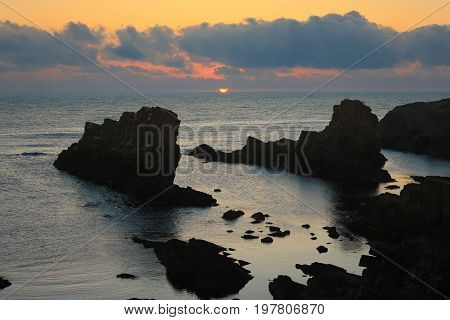 Dramatic sunrise on the beach with rocks Sinemorets Bulgaria