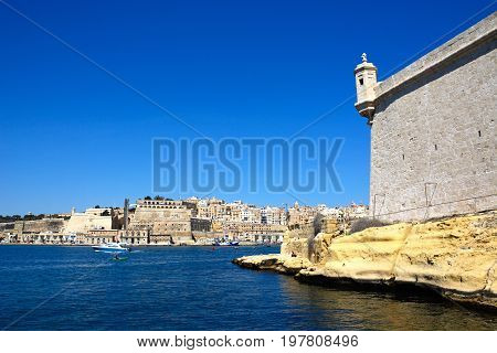 Corner tower on Fort Saint Angelo with views towards Valletta Vittoriosa (Birgu) Malta Europe.