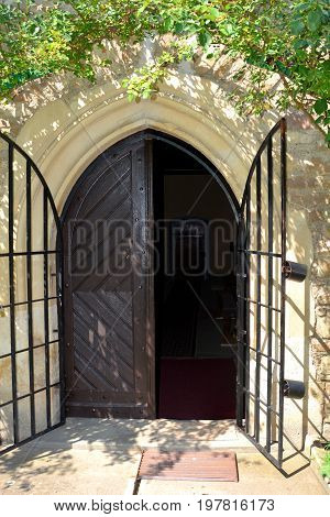 Gate.  Fortified medieval church in the village Malancrav, Transylvania.