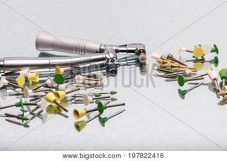 dental and endodontic instruments on the mirror. Top view