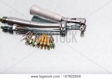 dental and endodontic instruments on the mirror. Top view