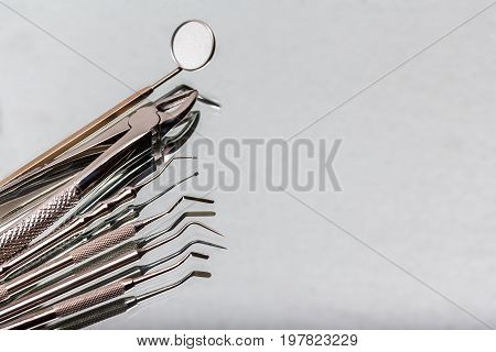 dental and endodontic instruments on the mirror. Top view