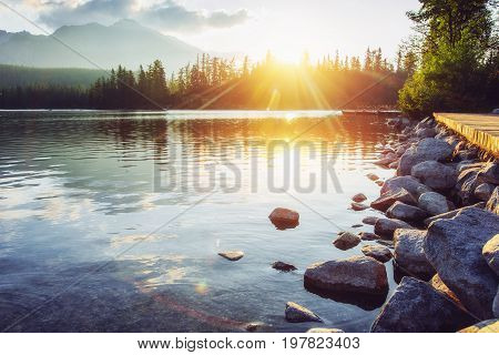 The Sunrise Over A Lake In The Park High Tatras. Shtrbske Pleso, Slovakia