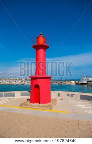 Red Lighthouse In Cambrils, Catalunya, Spain. Vertical. Copy Space For Text.