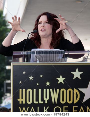 LOS ANGELES - FEB 14: Megan Mullally på gå av Fame Star ceremoni för Alec Baldwin på Beso Res