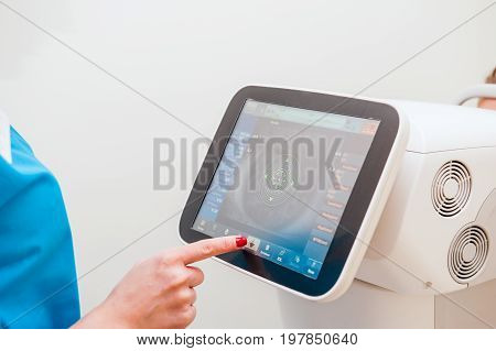 Doctor Controls Instrument Exploring Patients Eye In Ophthalmology Clinic, Auto-ref-keratometer. Clo