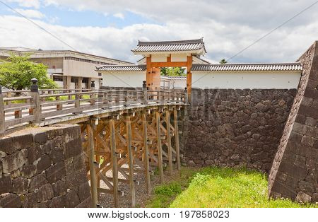 YAMAGATA JAPAN - MAY 28 2017: Reconstructed Otebashi Bridge (2005) and Ichimonji Gate (2014) of Main Bailey of Yamagata Castle (founded in 1356). National historical site of Japan since 1986