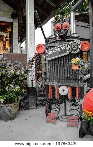 display metal robot vintage with welcome backboard