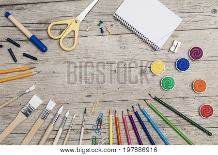 School Accessories On A Wooden Background