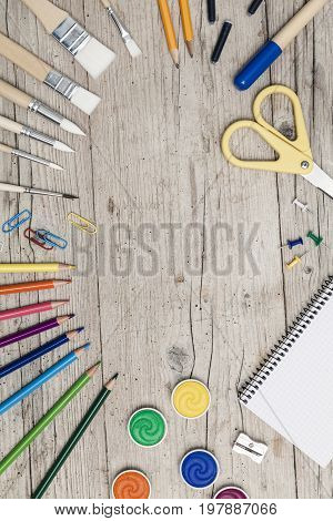 School Accessories On A Wooden Background