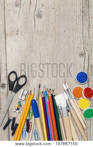School Accessories On A Wooden Background