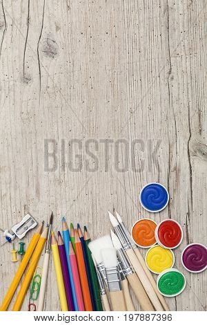 School Accessories On A Wooden Background