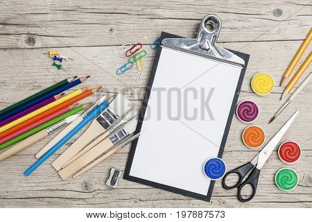 School Accessories On A Wooden Background