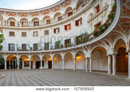 Cabildo Square Plaza del Cabildo traditional patio area in the center of Seville. Spain. Andalusia.