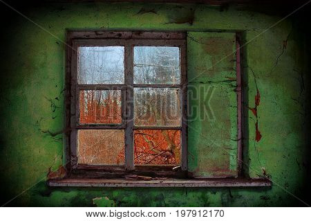 Old broken window with old painted green wall