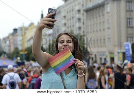 Prague, Czech Republic, August 15, 2016, Editorial photo girl with rainbow flag who is take a selfie, Prague, Czech Republic